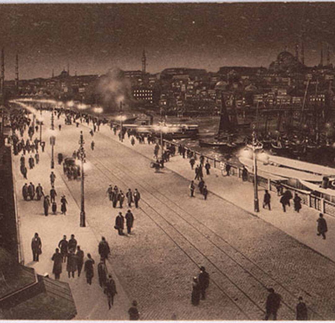 Photo of the Galata Bridge and tram lines illuminated with Osram lamps, c. 1910s. Atatürk Library, Istanbul.